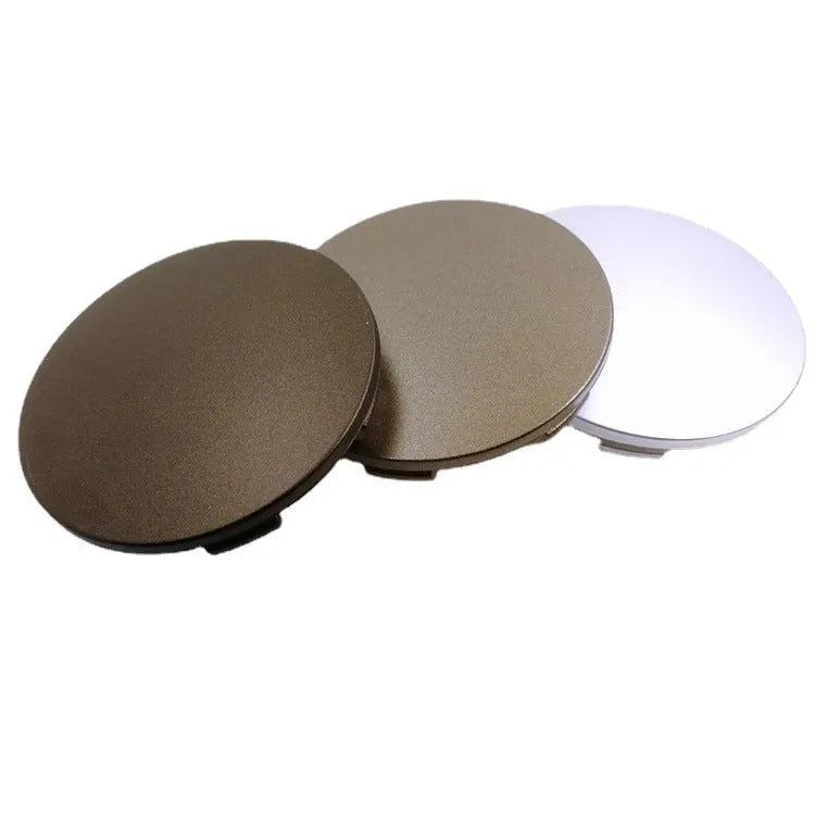 65mm diameter ABS plastic car hub centre cover in antique copper finish with aluminium label.