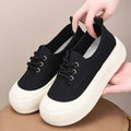 Women's beige suede platform loafers with round toe and front lace-up on a 4cm rubber sole.