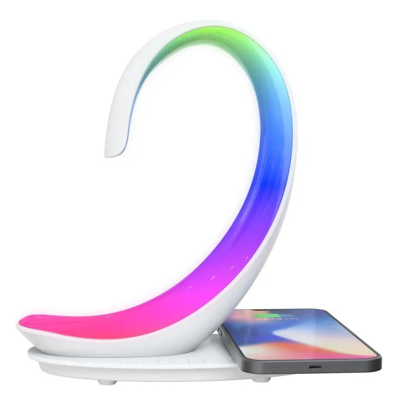 White swan shaped desktop wireless charger with Bluetooth speaker and colourful atmospheric lighting