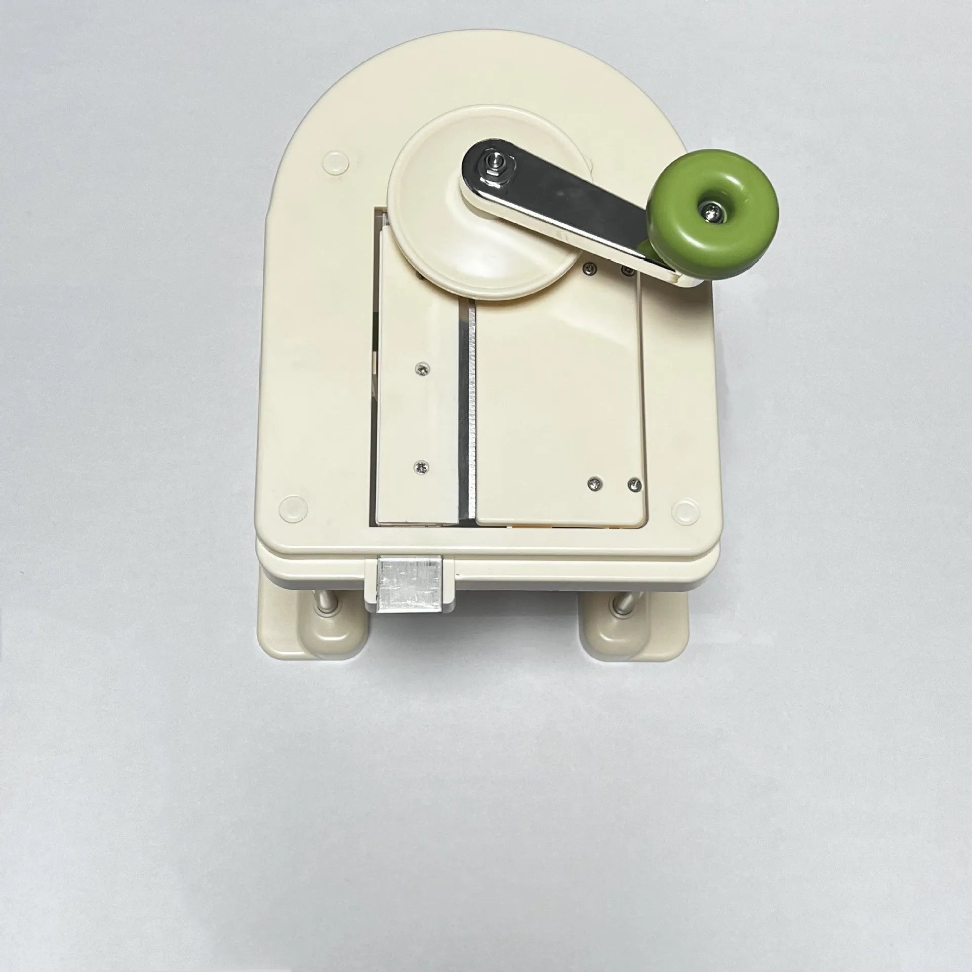 Beige stainless steel kitchen vegetable slicer chopper and grater tool