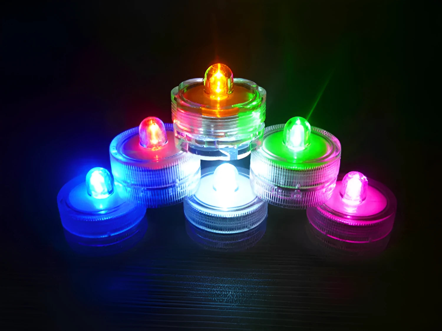 Set of 12 miniature LED waterproof candle lights in 7 colours with round and plum shapes