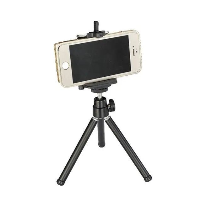 Mini flexible aluminium tripod with ball head and separate phone clip on desktop