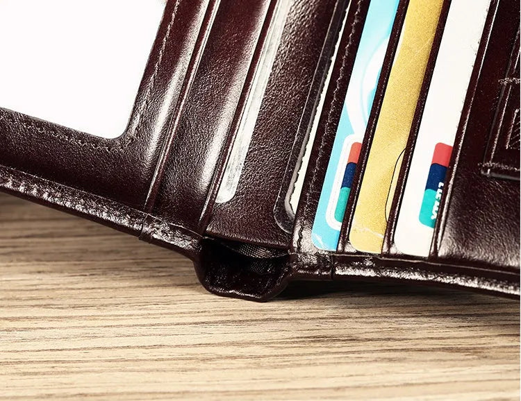 Men's leather wallet showing multiple internal compartments including photo slot and card holders