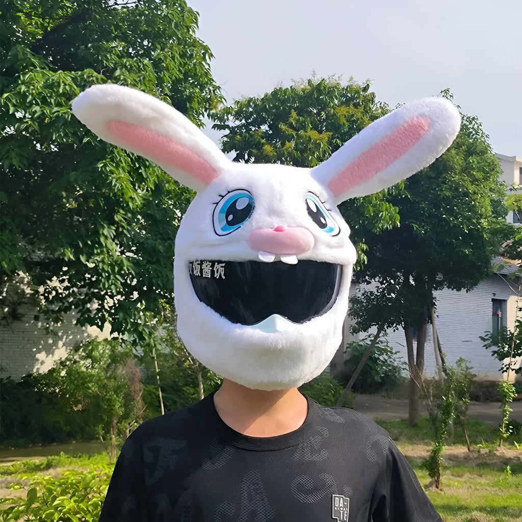 White plush rabbit head cover with long ears designed for an electric motorcycle helmet.
