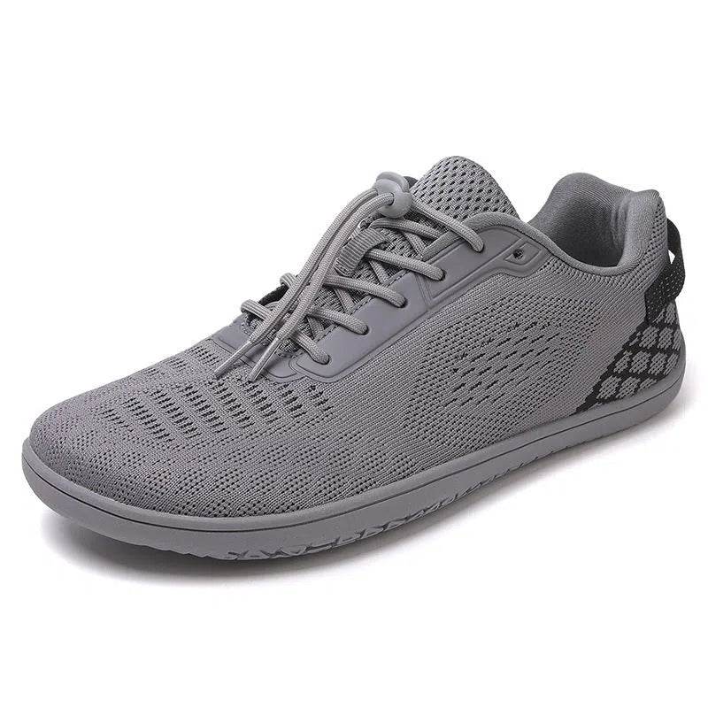 Extra wide barefoot shoes for couples with wide toe box, non-slip rubber outsole, and fly woven cotton upper in beige