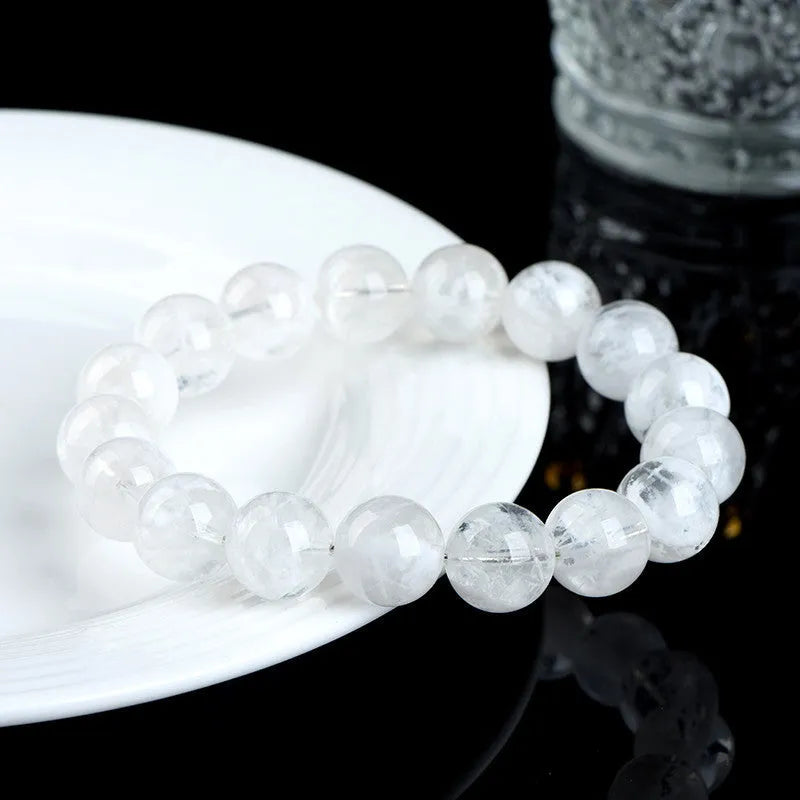 Women's crystal bracelet with geometric design featuring blizzard snowflake beads and traditional Ruyi Xiangyun motifs