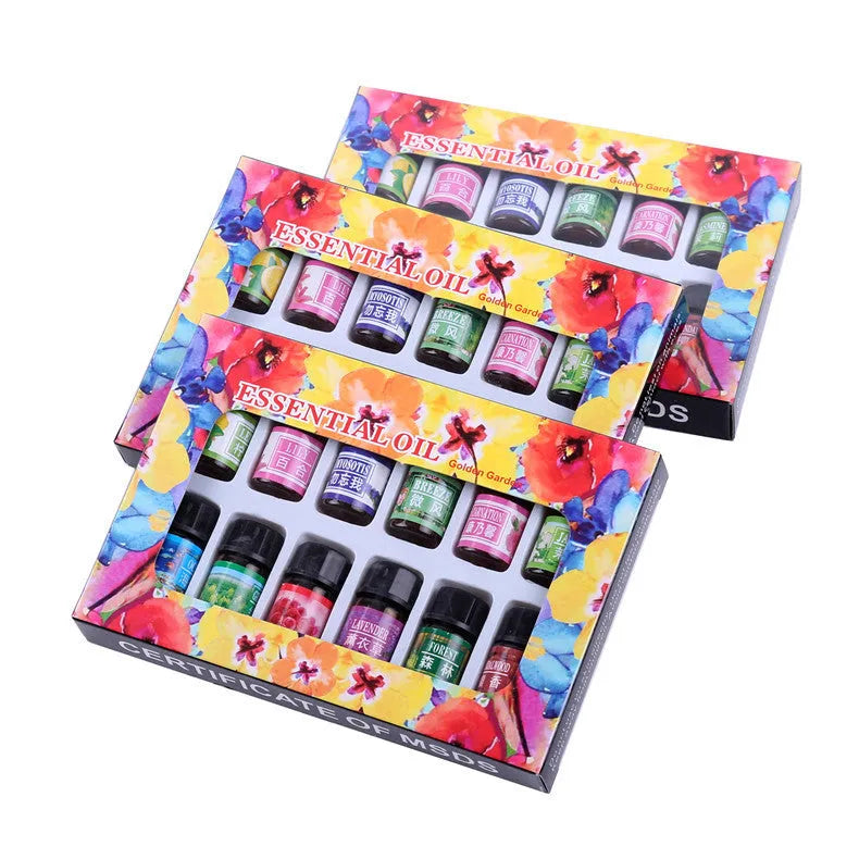Set of 12 water-soluble humidifier essential oils in 3ML bottles with assorted fragrances including rose, lavender, and lemon