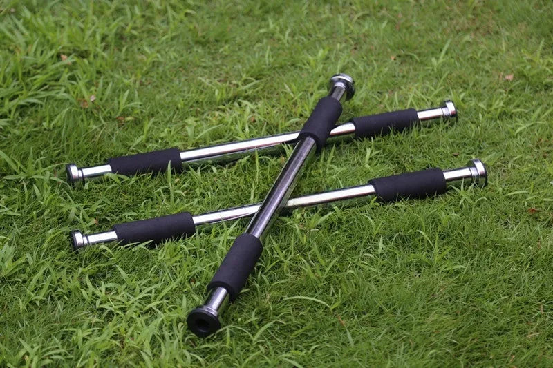 Steel adjustable indoor pull-up bar extended to fit within a door frame.