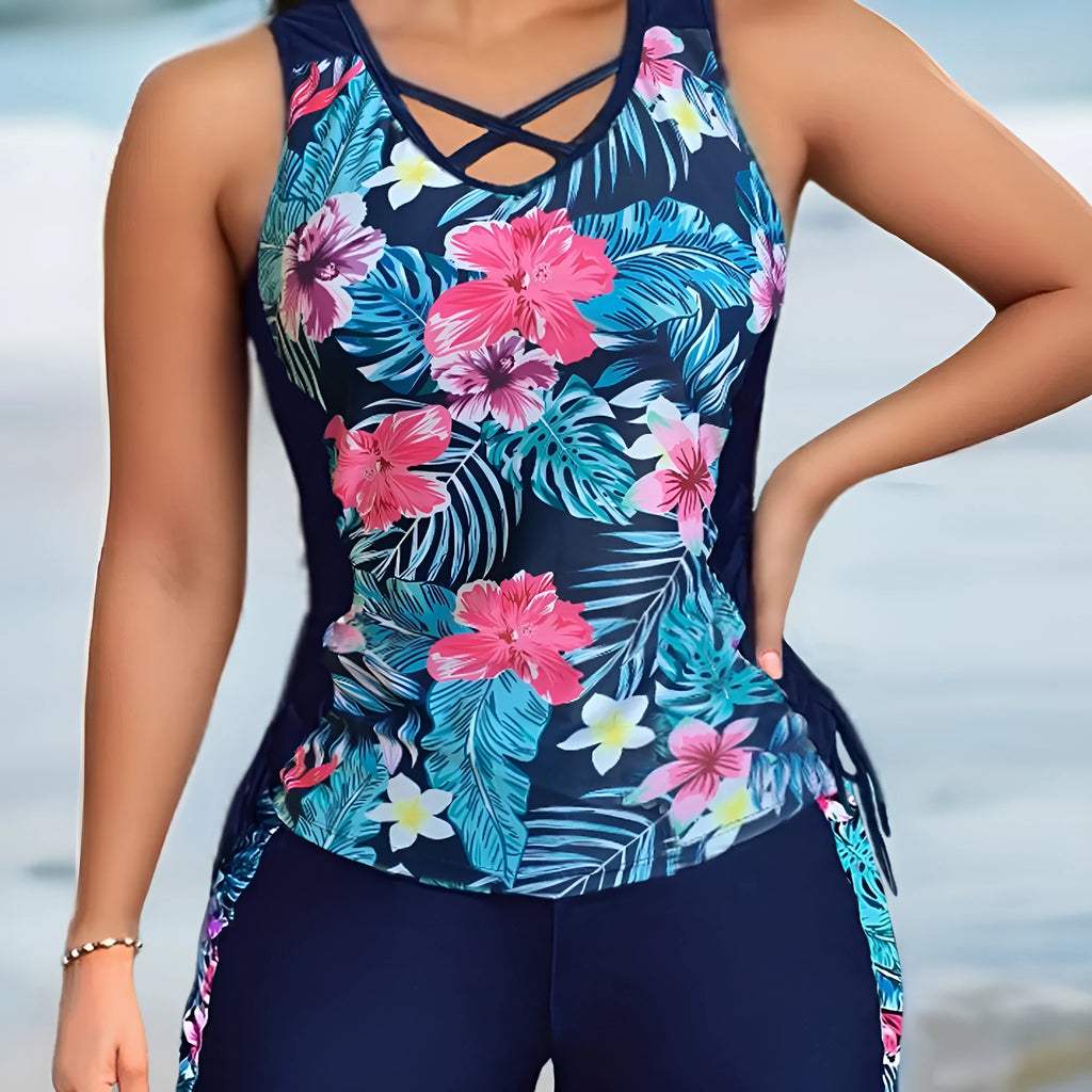 Women's plus size floral print high-waist swimsuit bikini in blue on a mannequin.