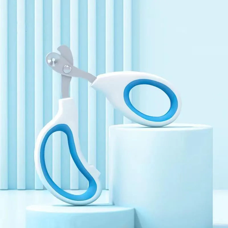 Blue cat nail clippers with circular hole design and ergonomic non-slip handle on a white background