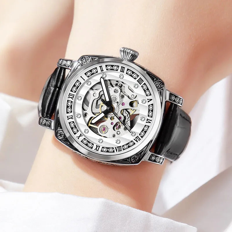 Mechanical wrist watch with luminous hands and leather strap in multiple colour options