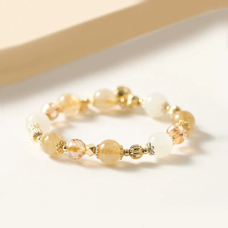 Gold rutilated quartz crystal bracelet with electroplated finish in Korean style design