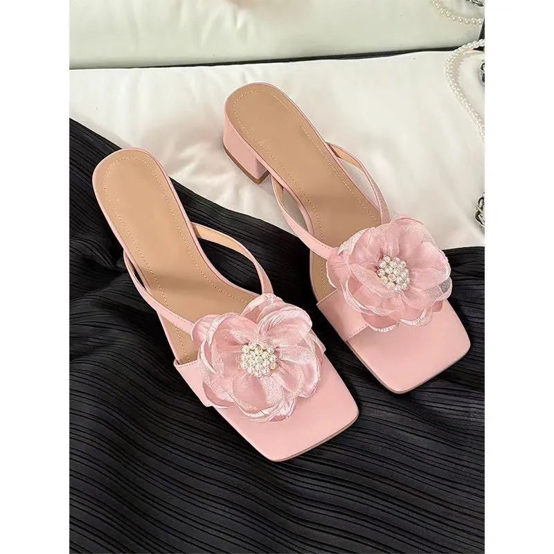Women's cream chunky heel sandals with a square toe and a single satin strap.