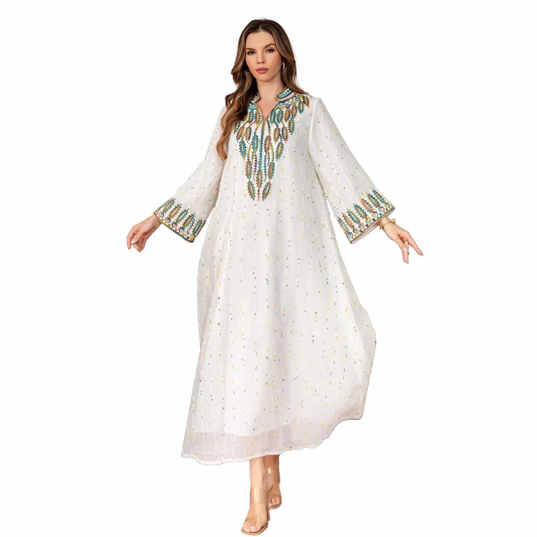 White long sleeve floor-length Arabic robe for women on a hanger