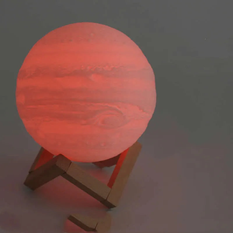 3D printed moon lamp showing detailed craters, with a touch metal ring at base for colour changing and dimming control.