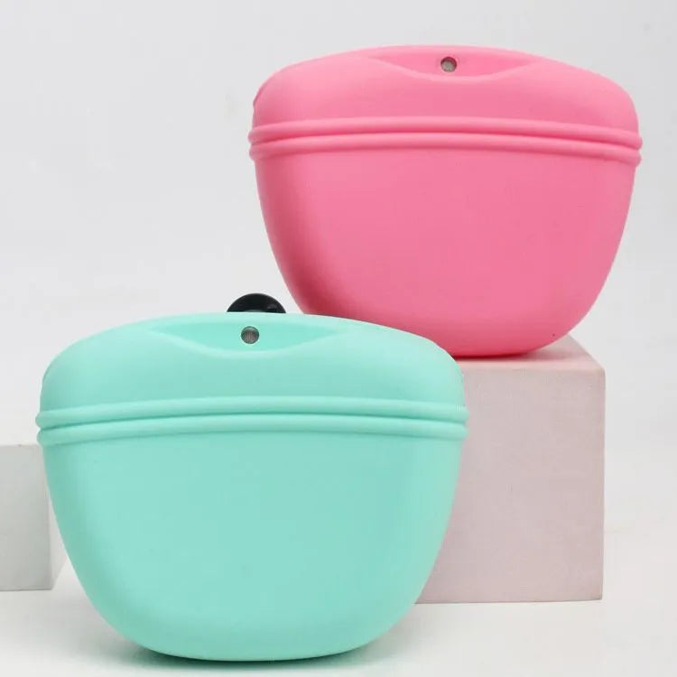 A silicone pet treat waist bag with a clip and magnetic flap closure in various colours.
