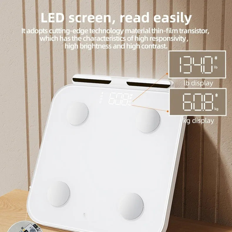 White intelligent body fat scale with eight metal electrodes and a large tempered glass platform.