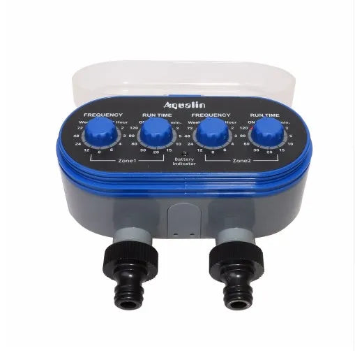 Dual timed irrigation controller with battery compartment and water connection ports