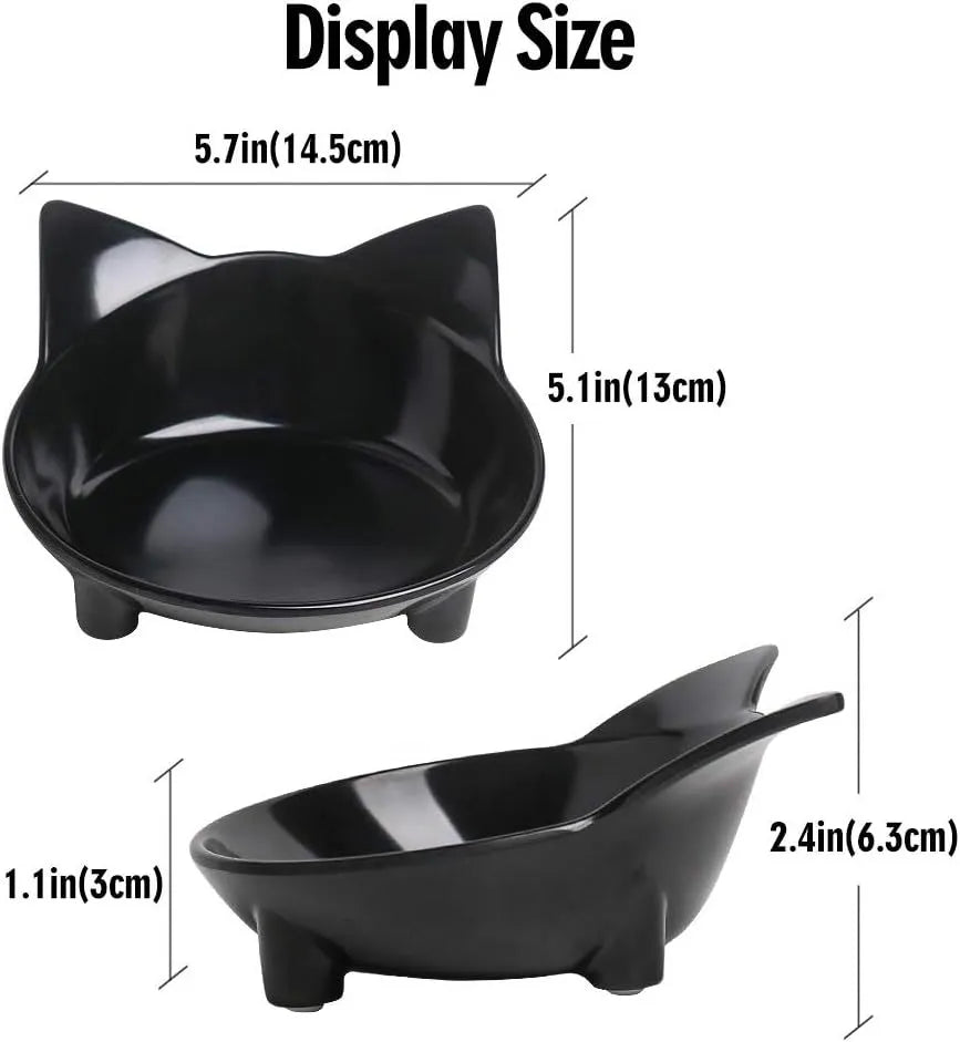 White shallow cat bowl with non-slip rubber base on a table.