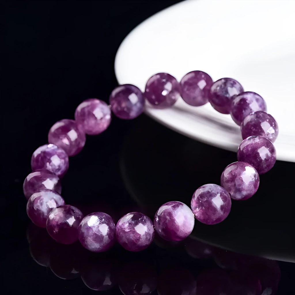 Grandmother polished crystal bracelet in geometric design showing pink purple 5A grade beads.