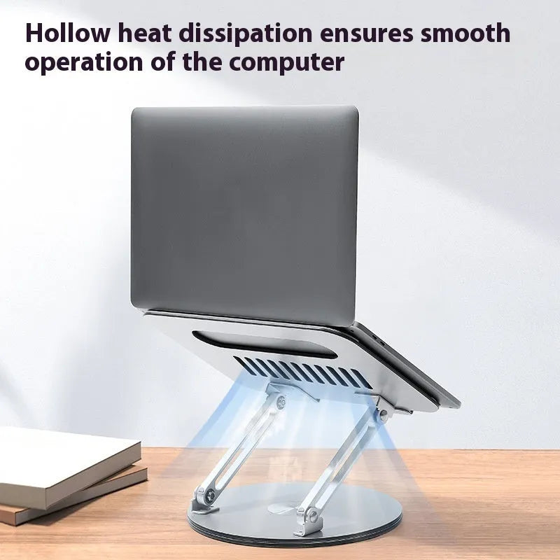 Silver aluminium alloy laptop stand with height adjustment and foldable design on desktop