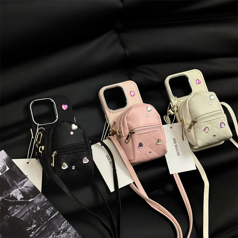 Crossbody wallet phone case for Apple iPhone with removable shoulder strap in antique white finish.