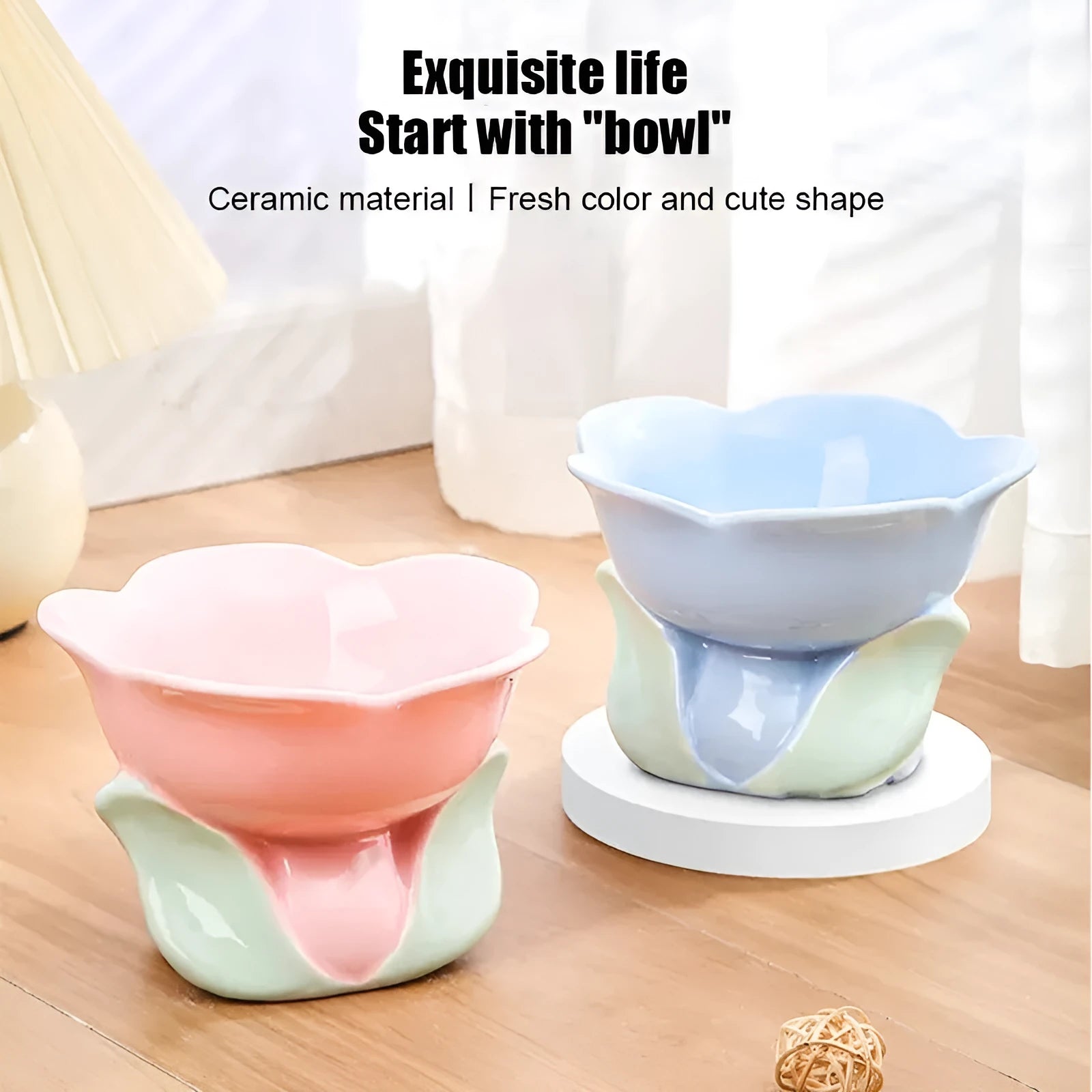 Blue ceramic elevated pet bowl with floral pattern and non-slip base for cat or small dog