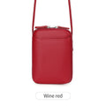 Simple women's vertical crossbody bag in solid colour with stitching details and single strap