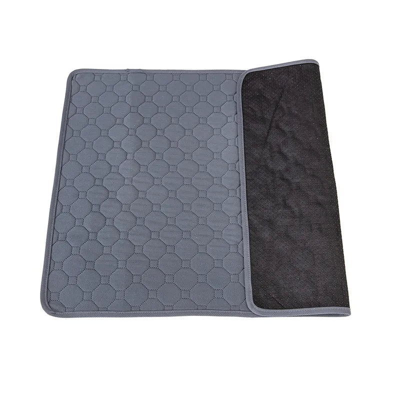 Grey and tan washable dog pee pads measuring 18x24 inches with triple-stitch binding