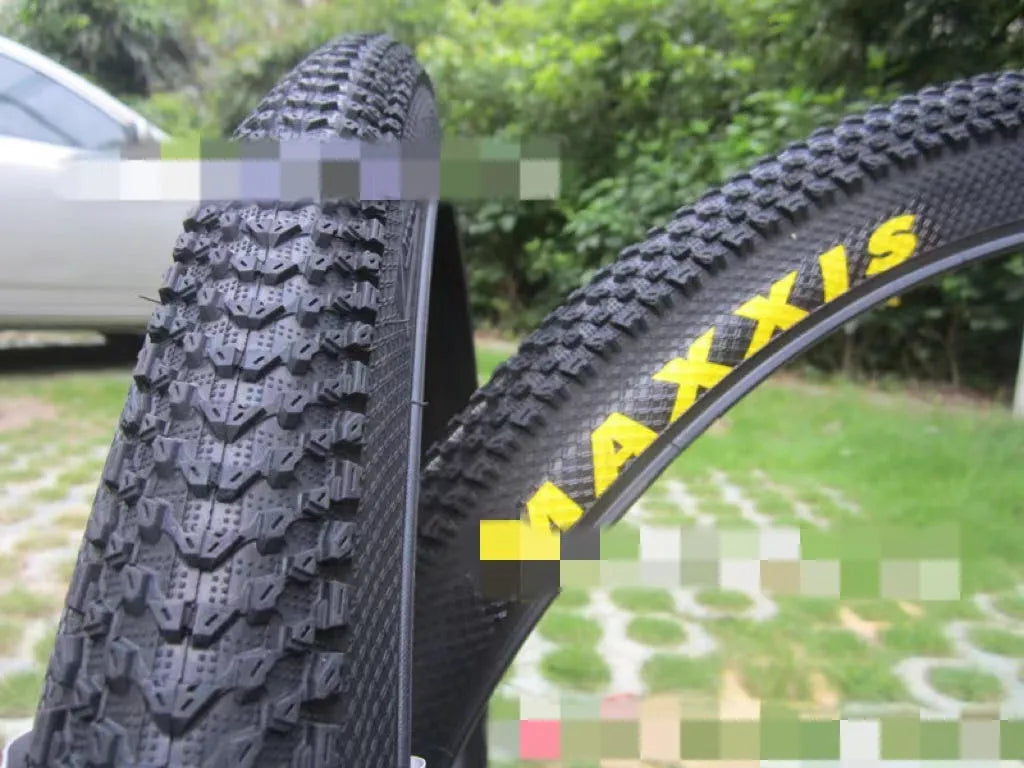Mountain bike ultralight puncture-proof tyre showing tread pattern and white-label sidewall variant.