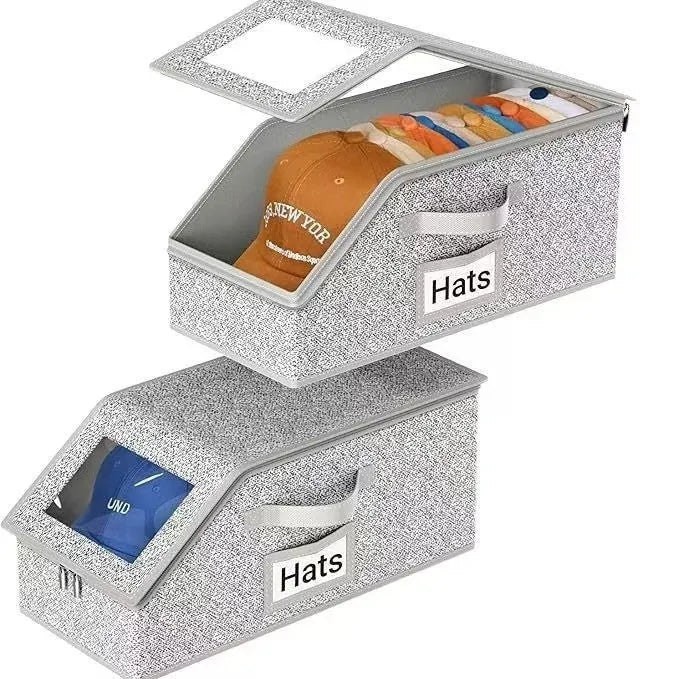 Grey foldable woven fabric storage box with lid, shown with dimensions 42cm by 22cm by 17cm.
