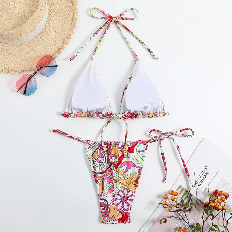 Women's multicolour triangle print bikini with hanging neck detail on separate top