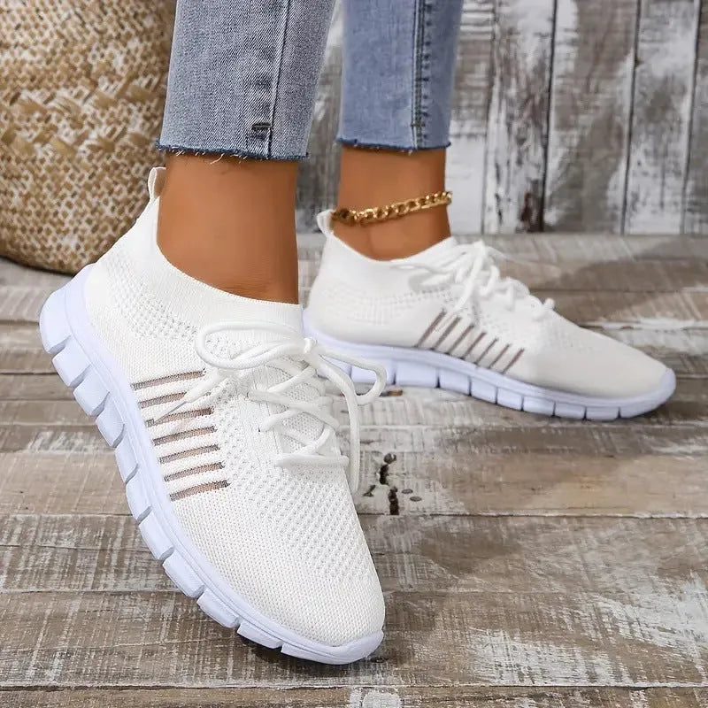 Women's casual mesh sports shoes in various colours with round toe and low heel design