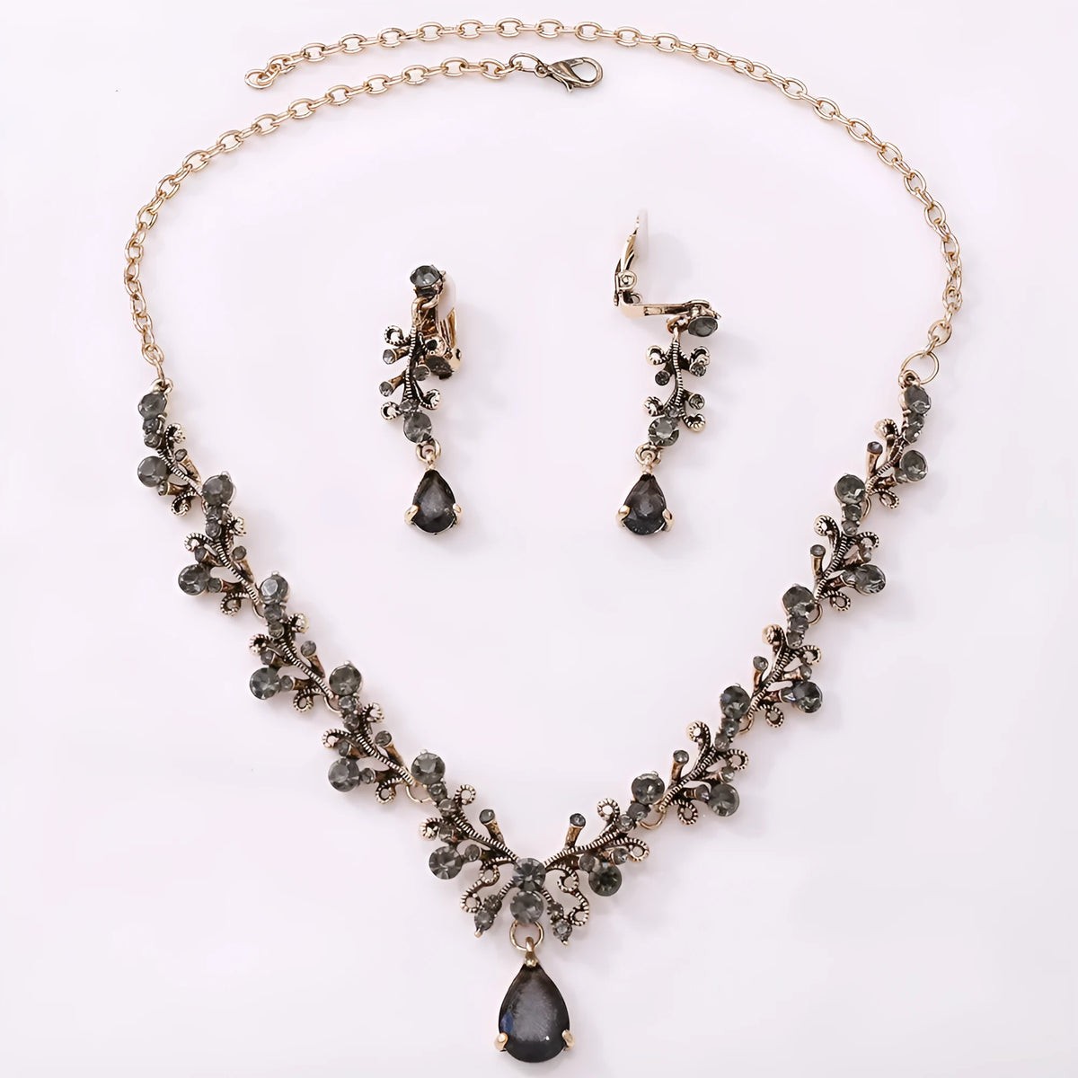 Bridal rhinestone zircon earring and necklace set in silver white finish on alloy base.