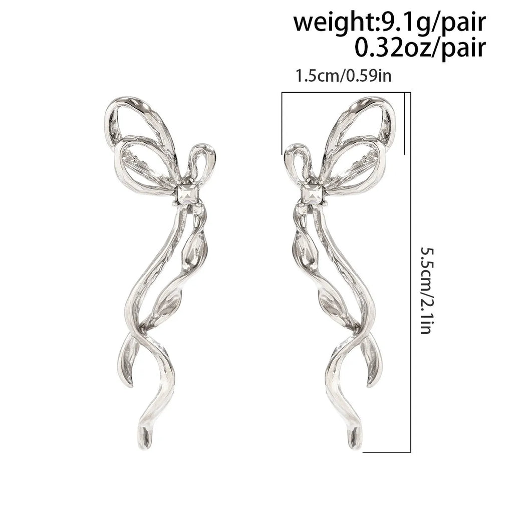 Bowknot earrings for women, alloy with electroplated White K finish, stud style, approximately 2.5cm width