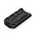White PS5 charging and cooling dock station with two controllers on charge and headset on hook