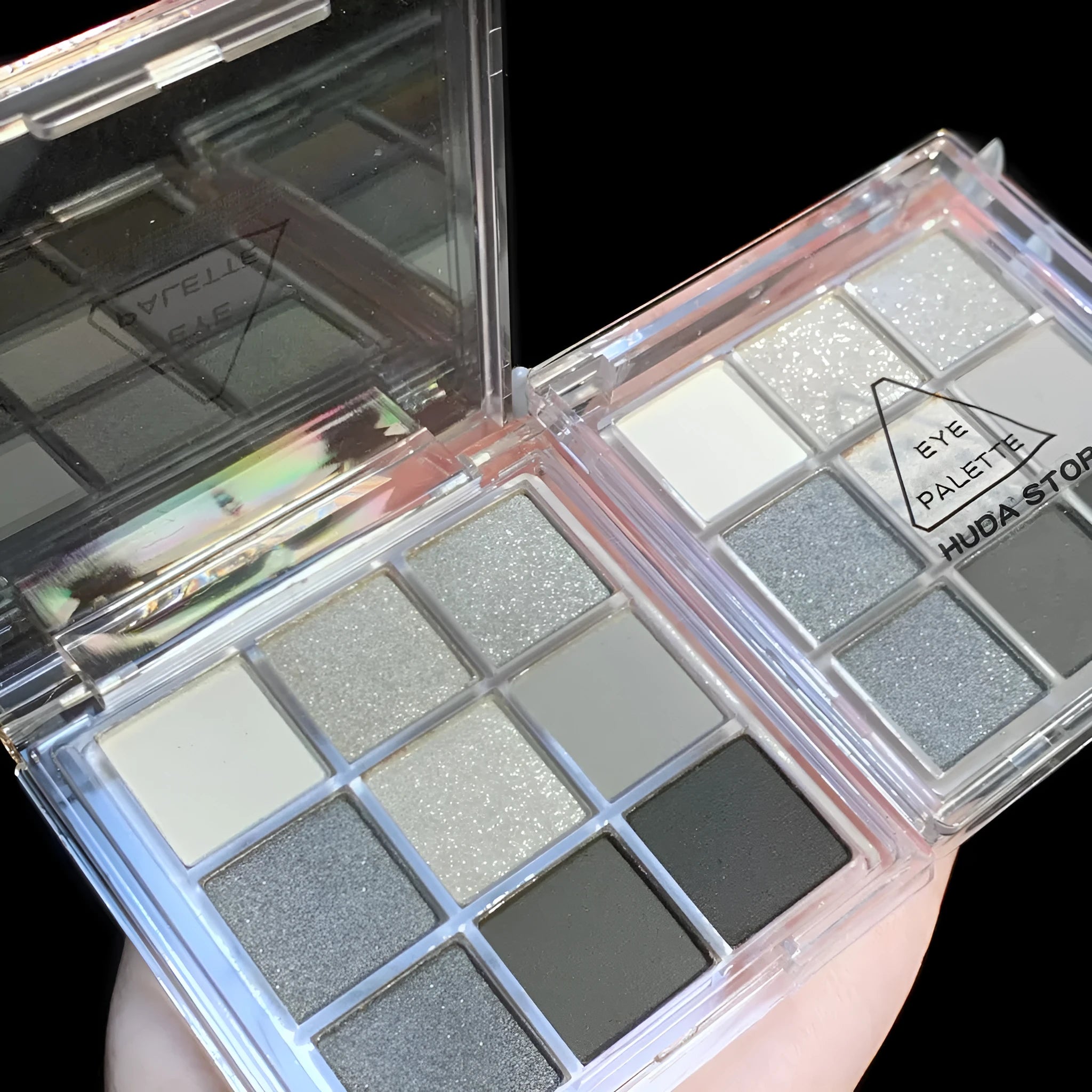 Nine-colour smoked eye shadow palette with white, silver, black, and iron grey shades