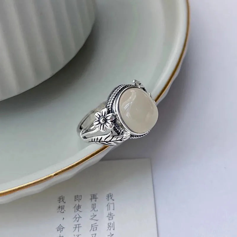 Adjustable vintage copper ring with antique finish and imitation white chalcedony colour