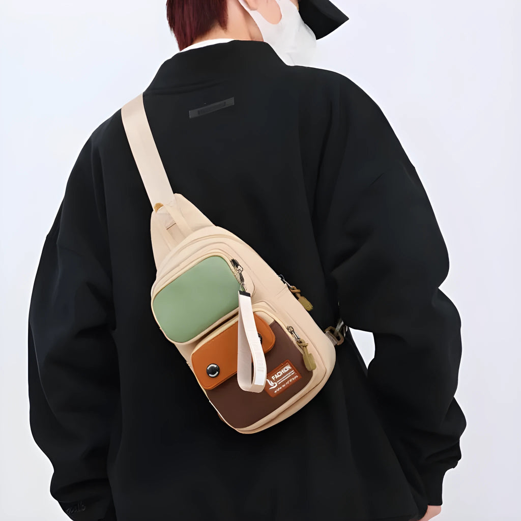 Nylon crossbody shoulder bag for outdoor leisure in beige contrast colour with letter pattern.