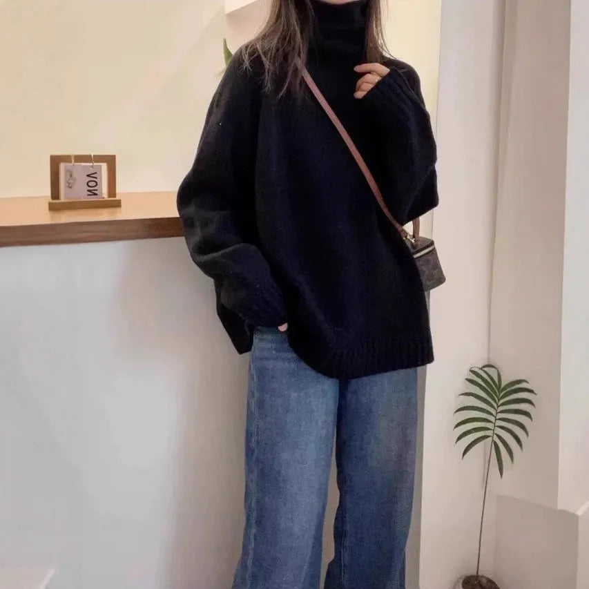 Women's loose fit turtleneck sweater with thick curling pile collar in camel colour