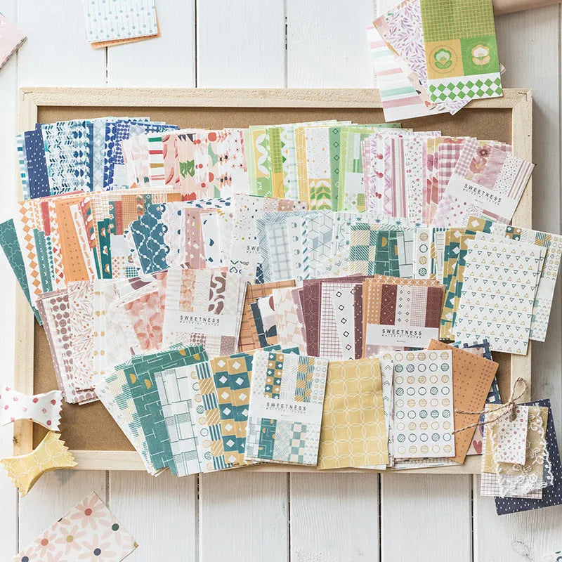 Fifty sheets of retro collage note paper in dessert colours, each measuring 56 by 83 millimetres.