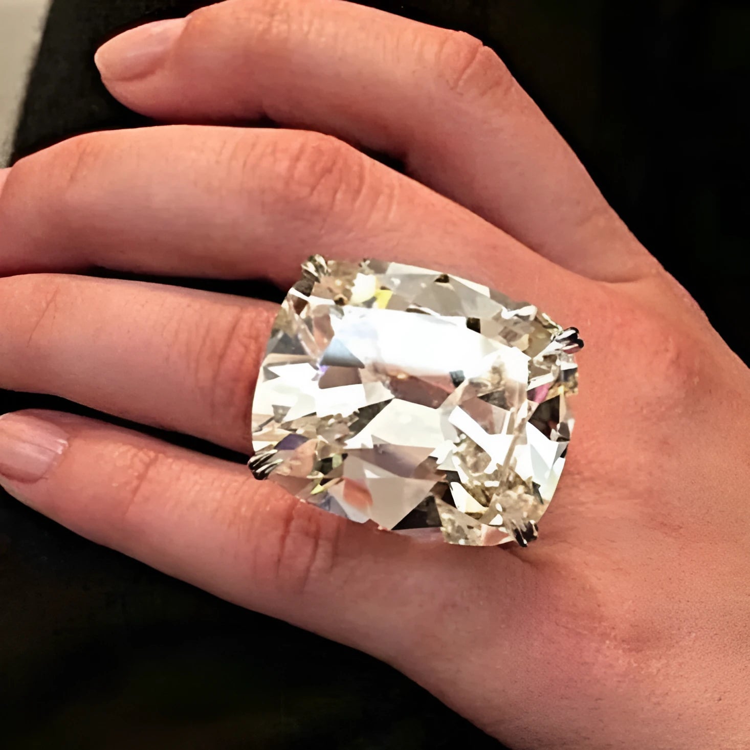 Women's white gold coloured square diamond ring with simple geometric design