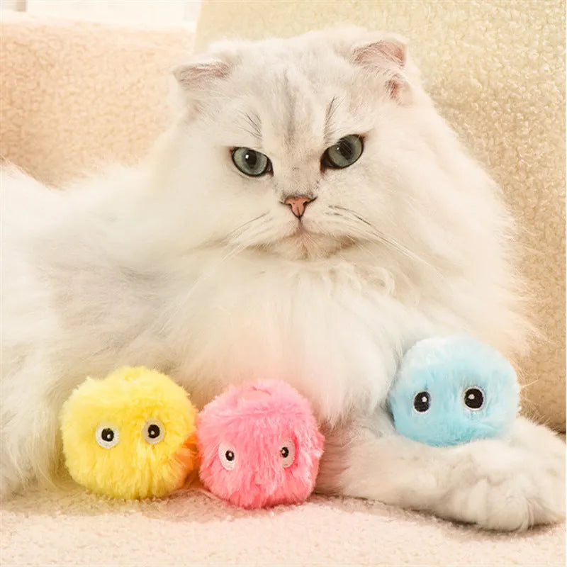 Glowing plush cat toy ball with catnip in blue frog design on white background