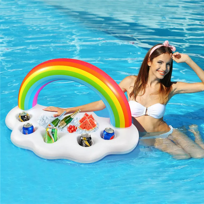 Rainbow inflatable pool float cooler with cloud shape and four glass holders floating on blue water