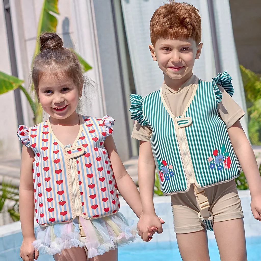 Children's foam swim vest in buoyancy vest pink strawberry colour, flower print pattern, nylon construction for swimming auxiliary