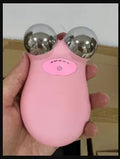 Micro current beauty instrument facial lifting device HS-858 in pink with compact design on white background
