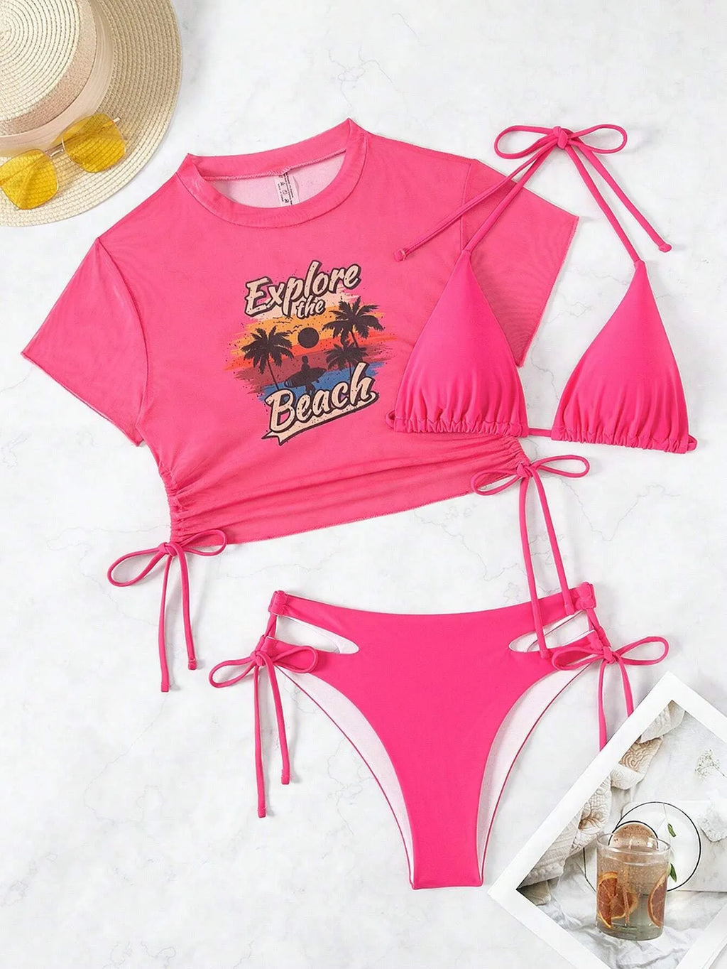 Women's three-piece bikini swimsuit set in black, shown with short sleeves and matching pants.