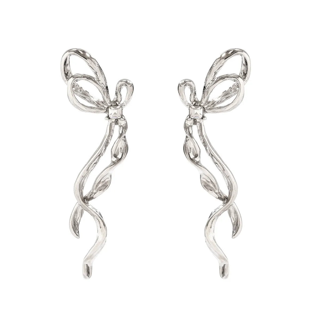 Bowknot earrings for women, alloy with electroplated White K finish, stud style, approximately 2.5cm width