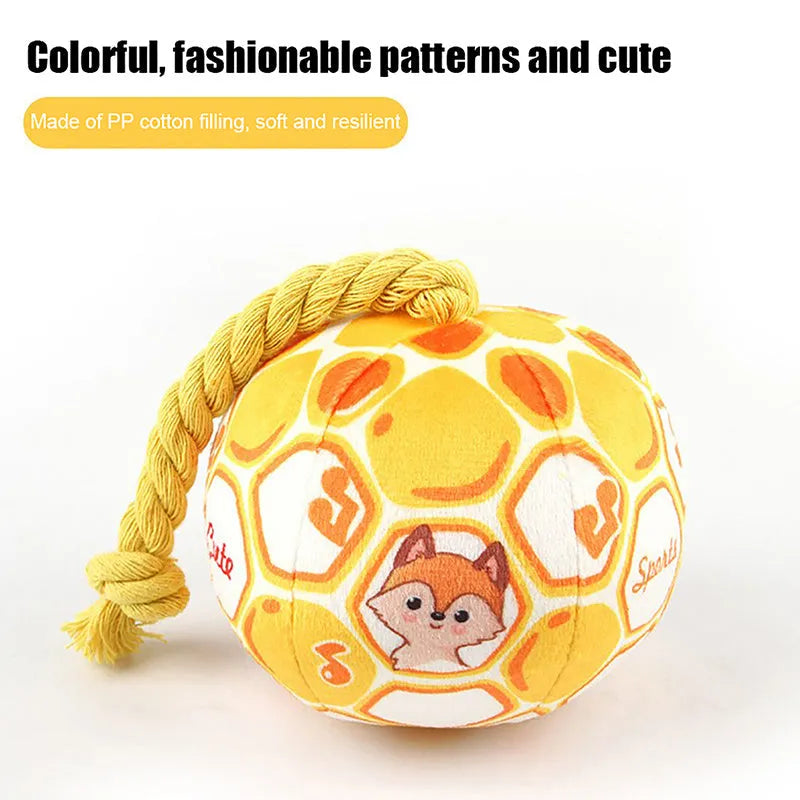 Blue and yellow elastic football tug of war dog toy with cotton rope ball for interactive play