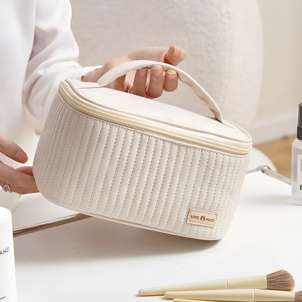 Cake-shaped open-top women's makeup bag in PU leather, shown in a solid colour from the available range.